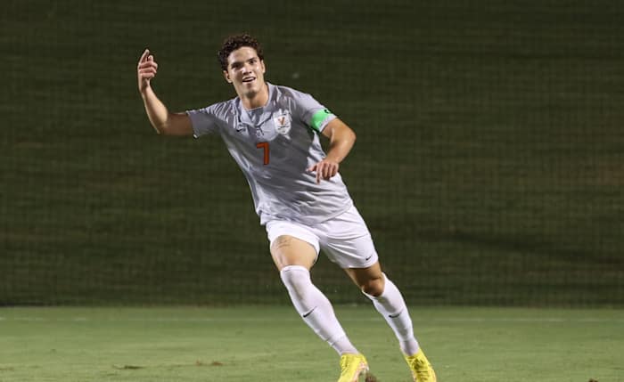 Virginia forward Leo Afonso celebrates after scoring a goal for the UVA men's soccer team.
